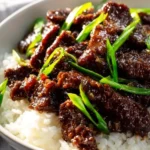 Delicious gluten-free Mongolian Beef served with vegetables and rice