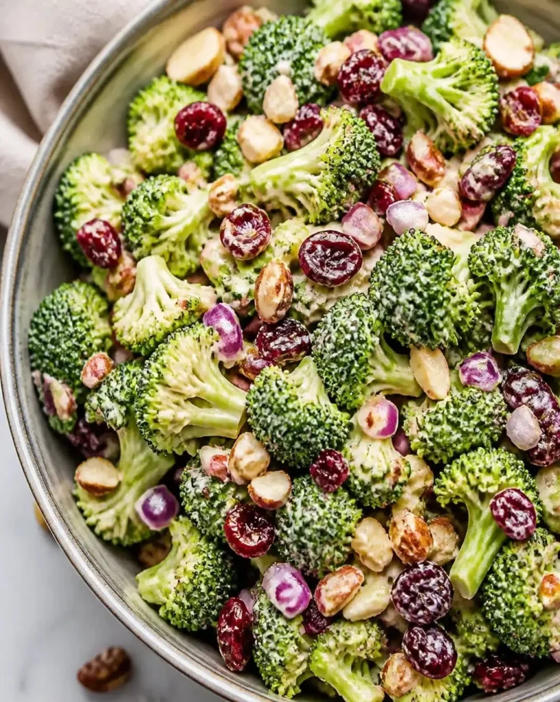 Fresh broccoli salad with colorful veggies and dressing